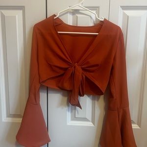Terracotta/Salmon colored cropped top - adjustable front ties with bell sleeves